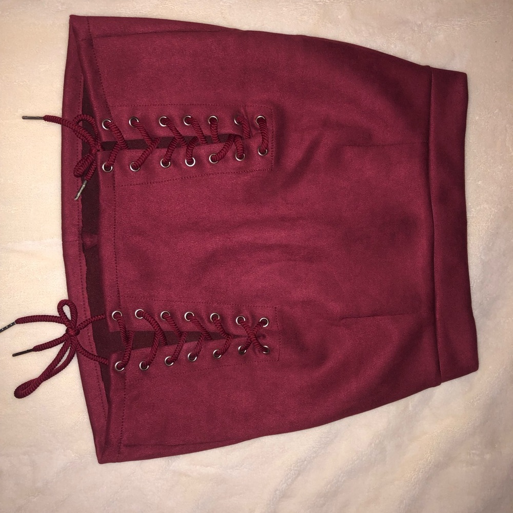 NWOT burgundy mini skirt … very nice and attractive with soft material